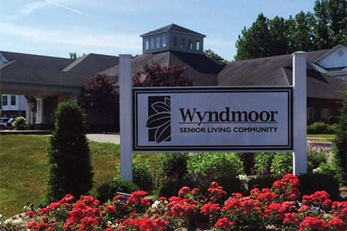 Building name on sign in front of Wyndmoor AL building